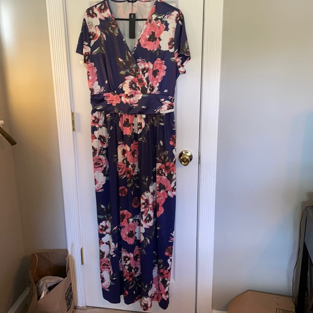 New with tags blue floral maxi dress .